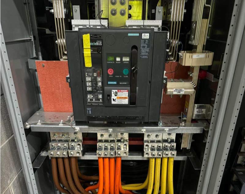 Commercial switchgear with Siemens circuit breaker and three-phase power distribution installed by Baker Electric Inc